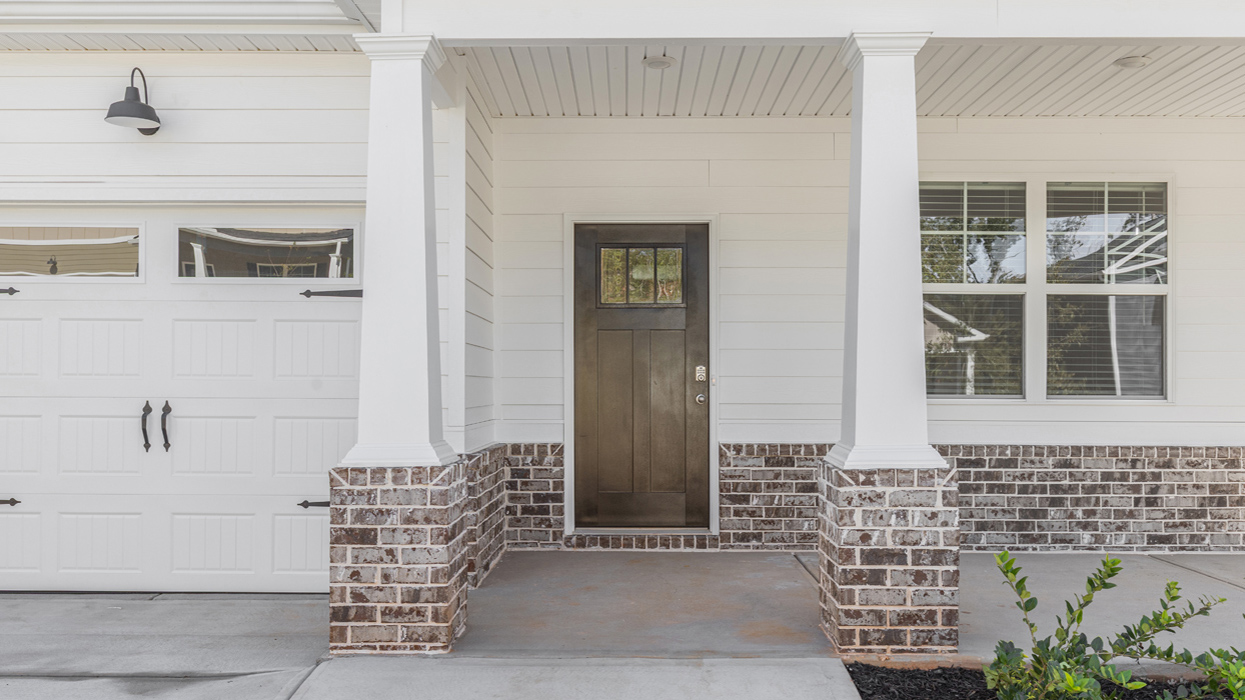 Covered front porch leading to front door