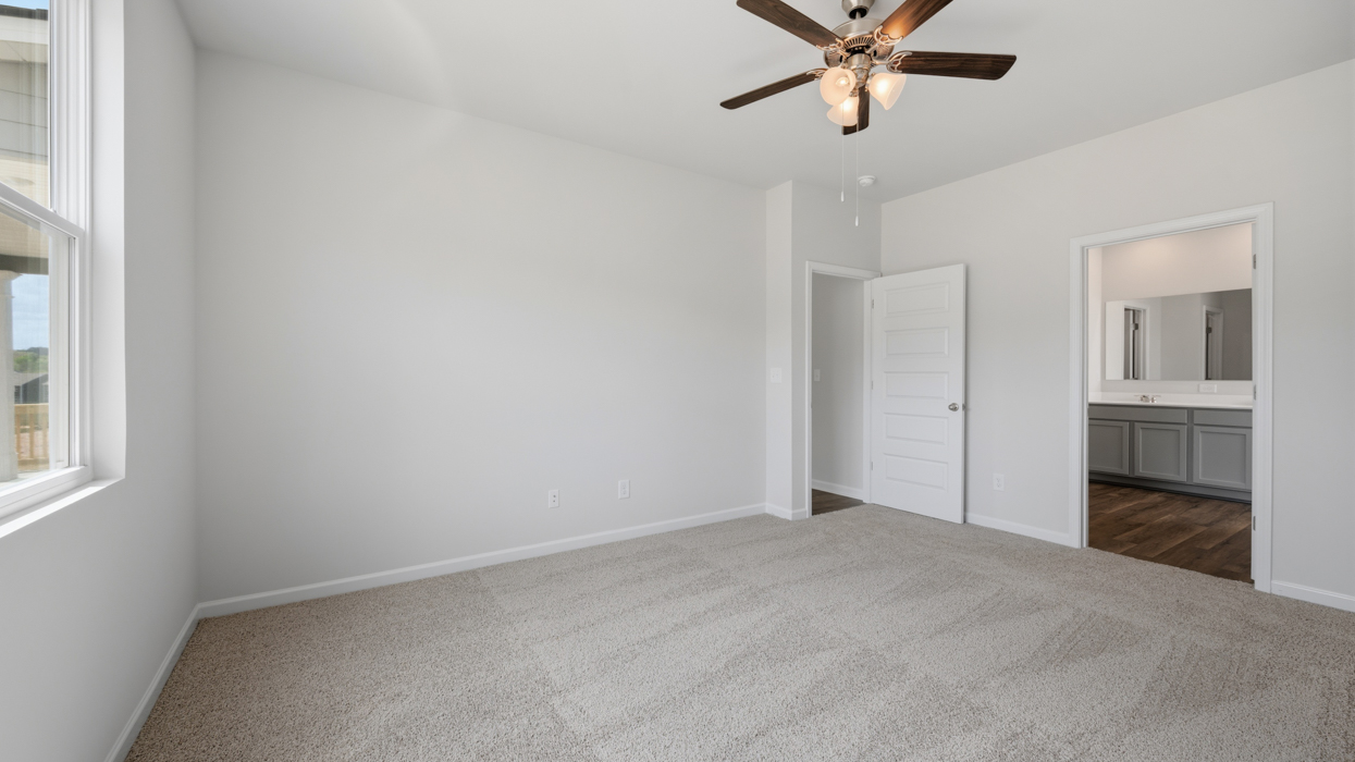 Primary bedroom off of living room on main