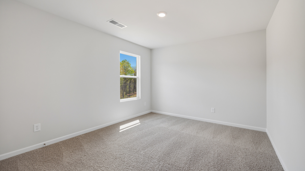 Guest bedroom upstairs with closet.