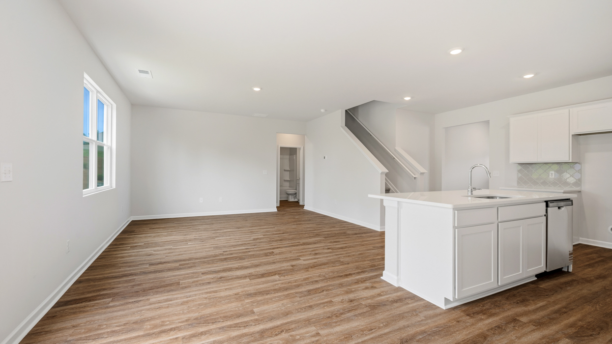 Main living area off of dining space and kitchen.