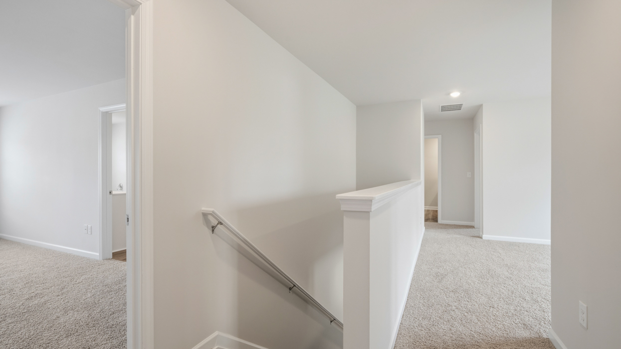 Loft area located at top of stairwell