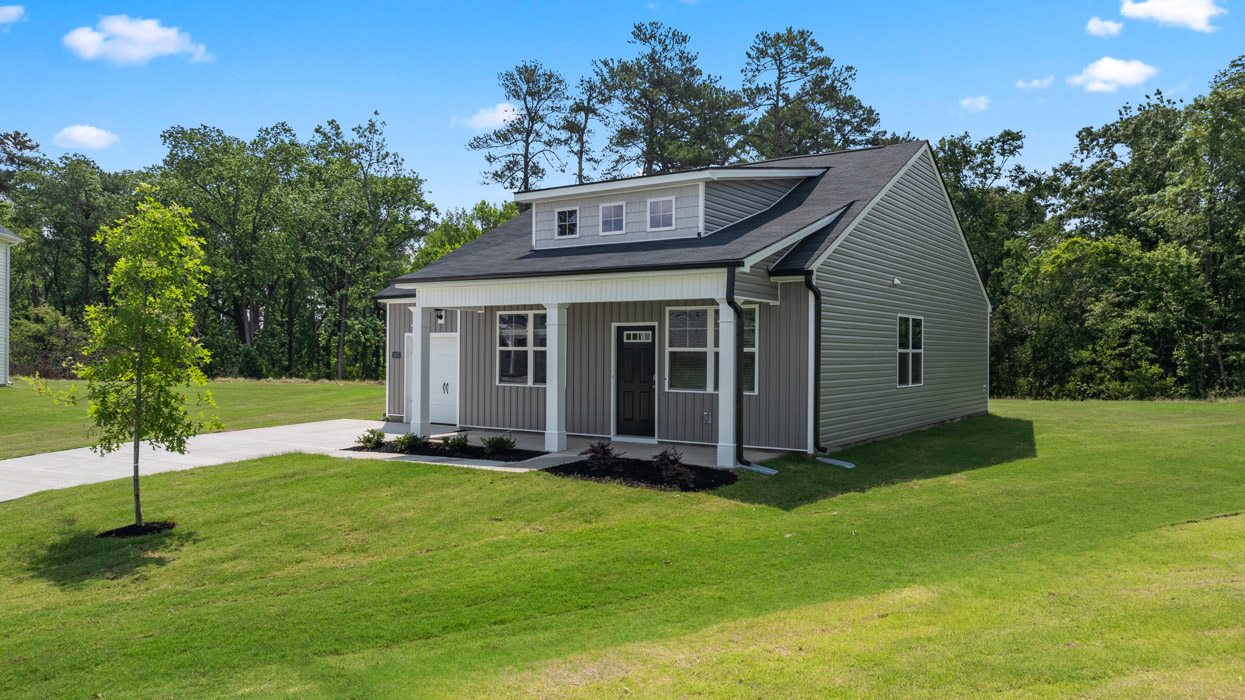 Single story ranch home on large homesite with one car garage