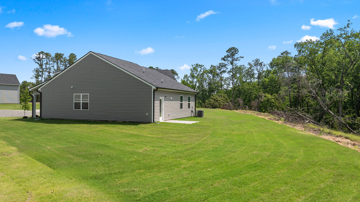 Single story ranch home on large homesite with one car garage