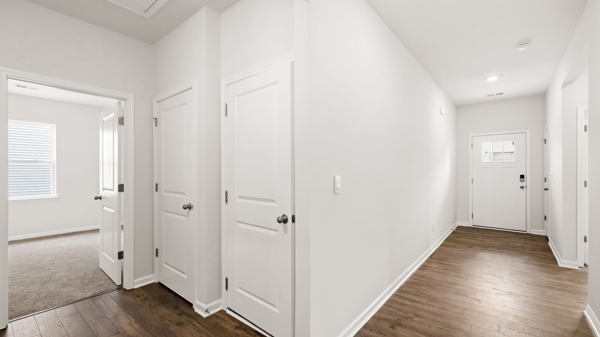 Hallways with view of multiple rooms