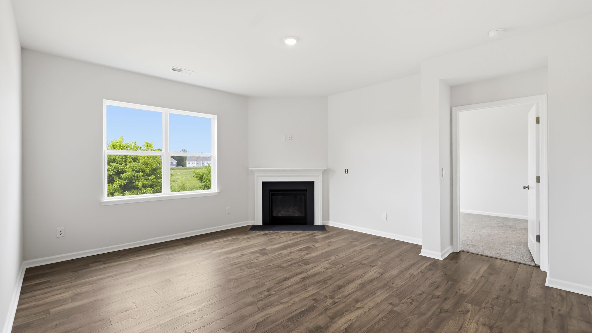 Open concept living area with gas fireplace