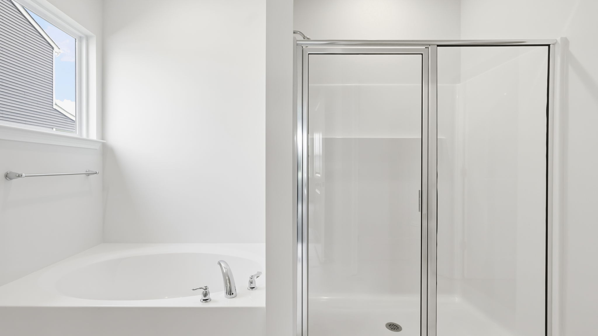 Primary bathroom with garden tub and walk in shower