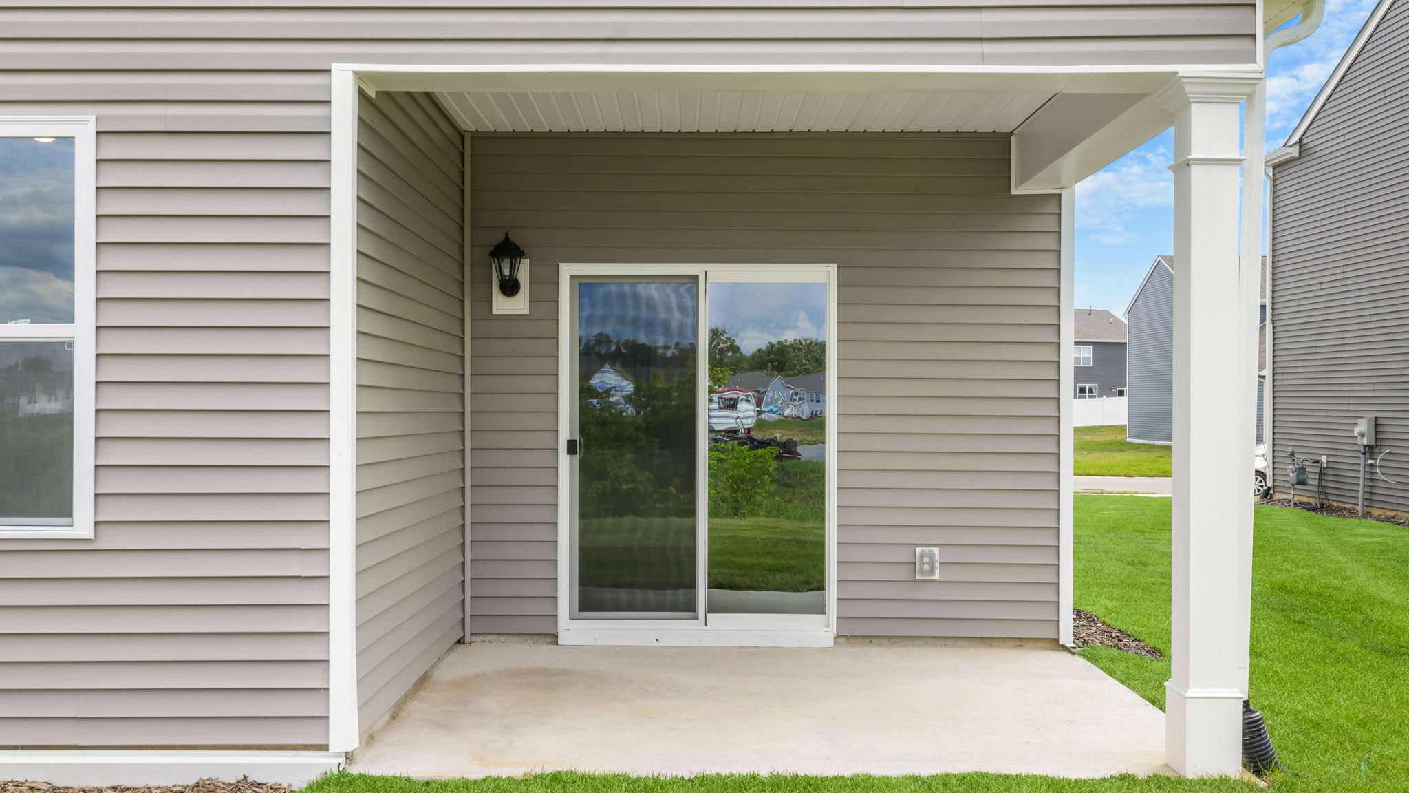 Exterior rear with covered back patio