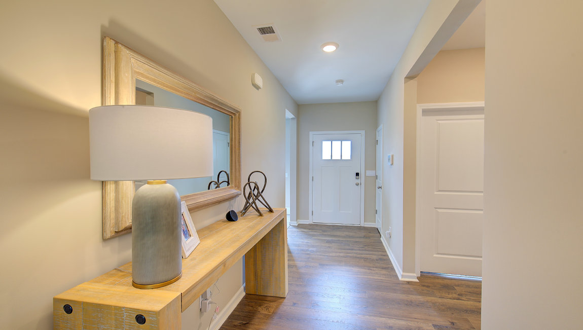 Welcoming foyer with front bedrooms