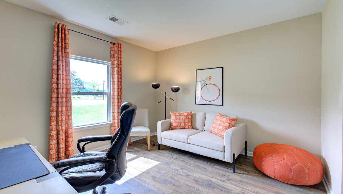 Carpeted bedroom set as home office
