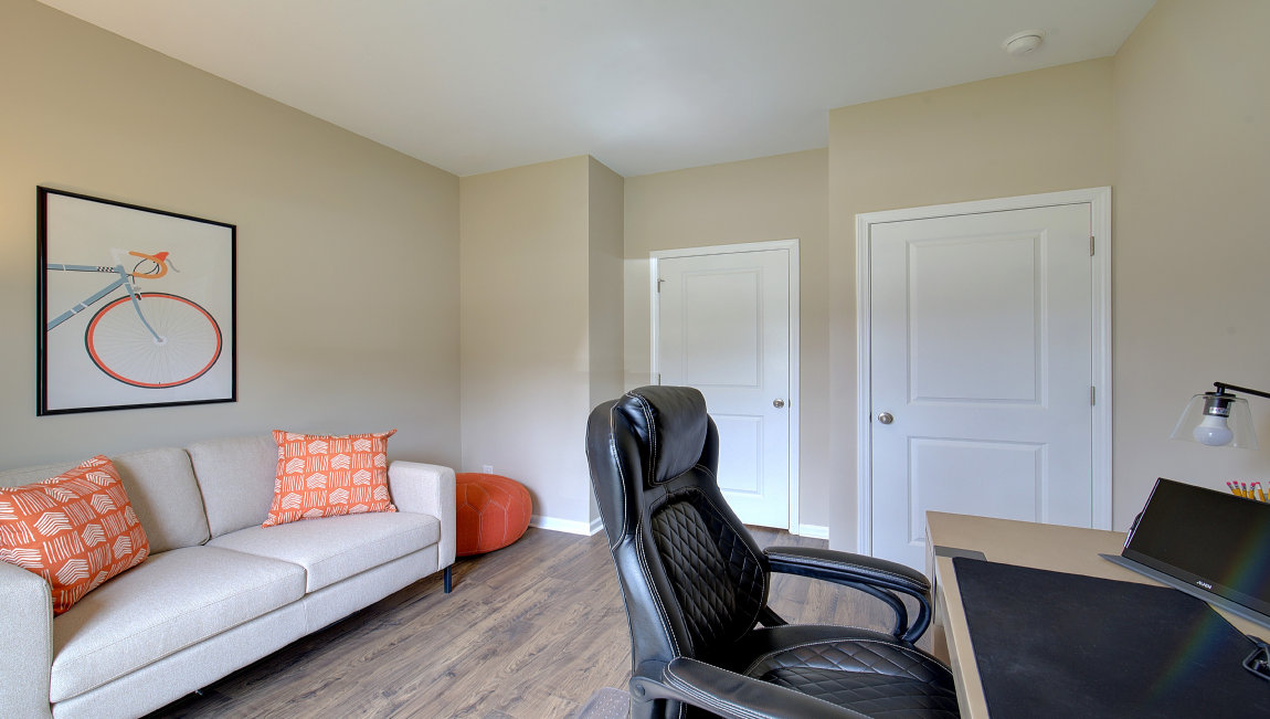 Carpeted bedroom set as home office