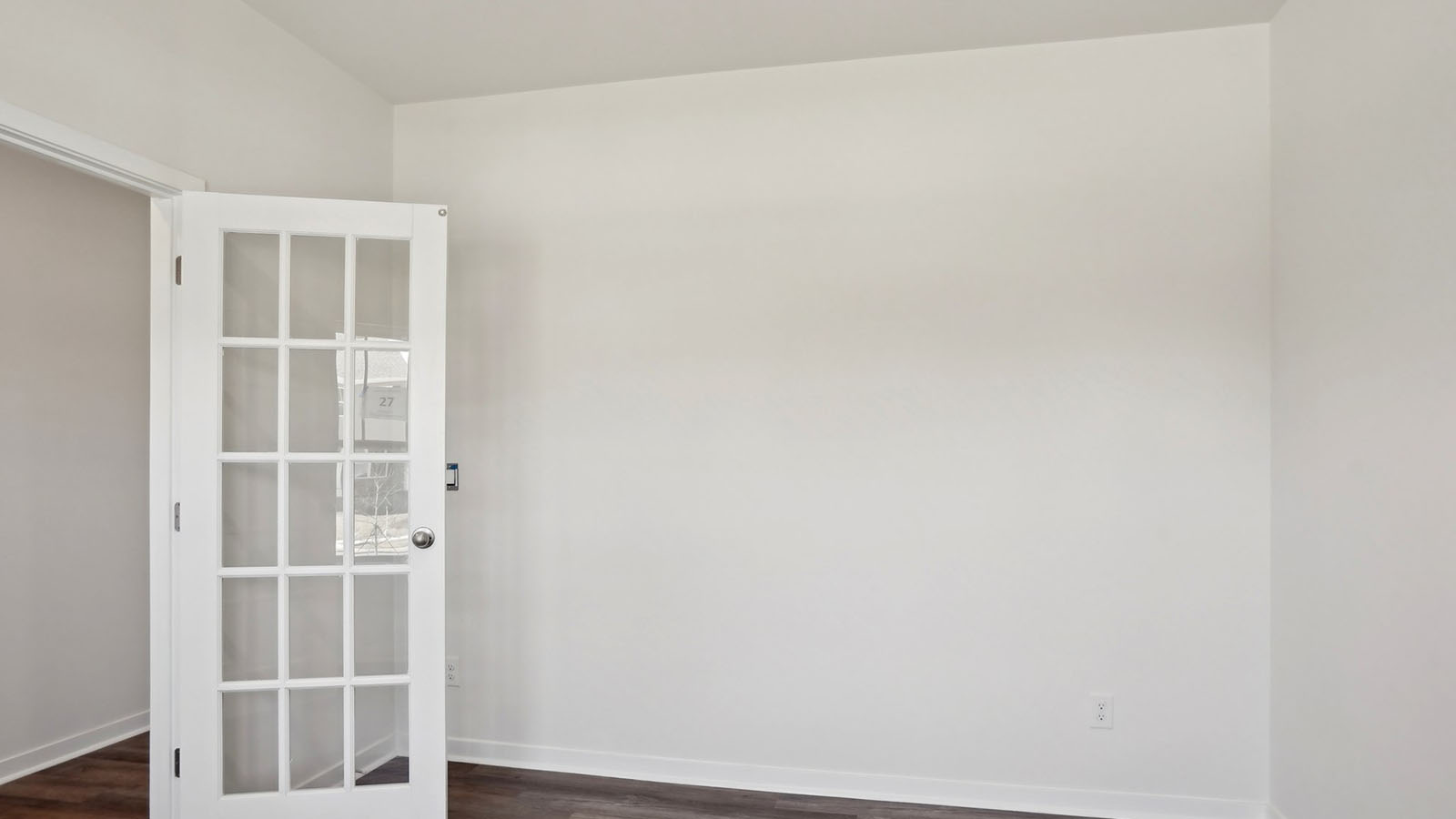 Bright office space with glass doors and big windows