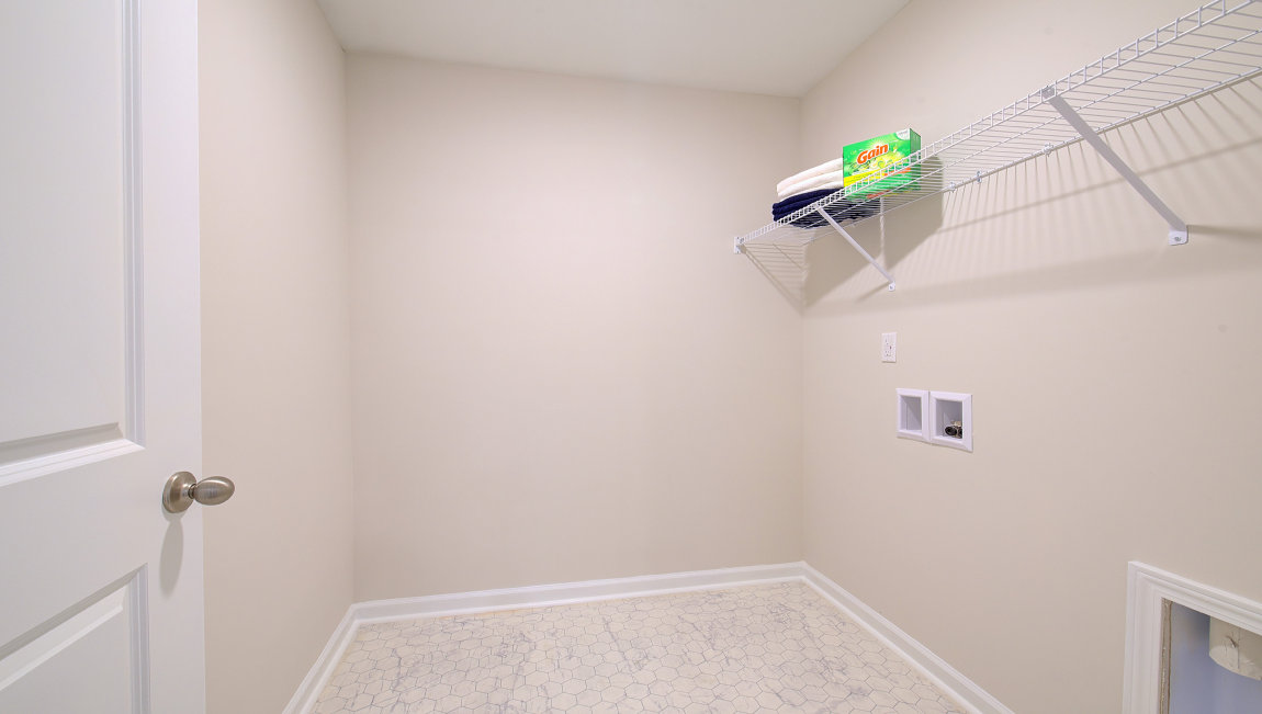 Laundry room with shelving