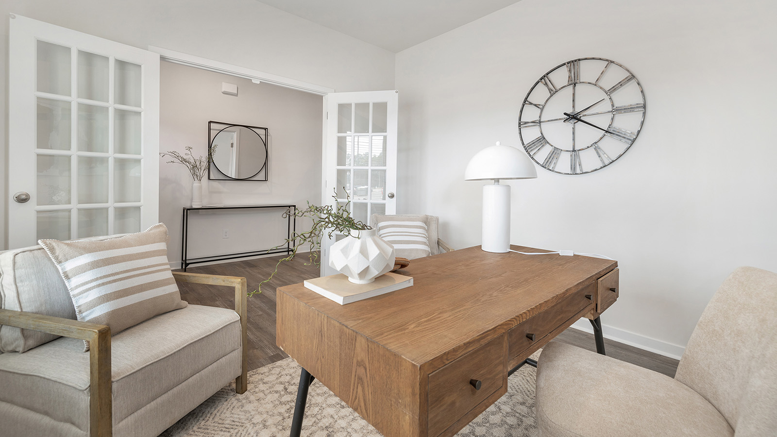 Office with two open glass doors