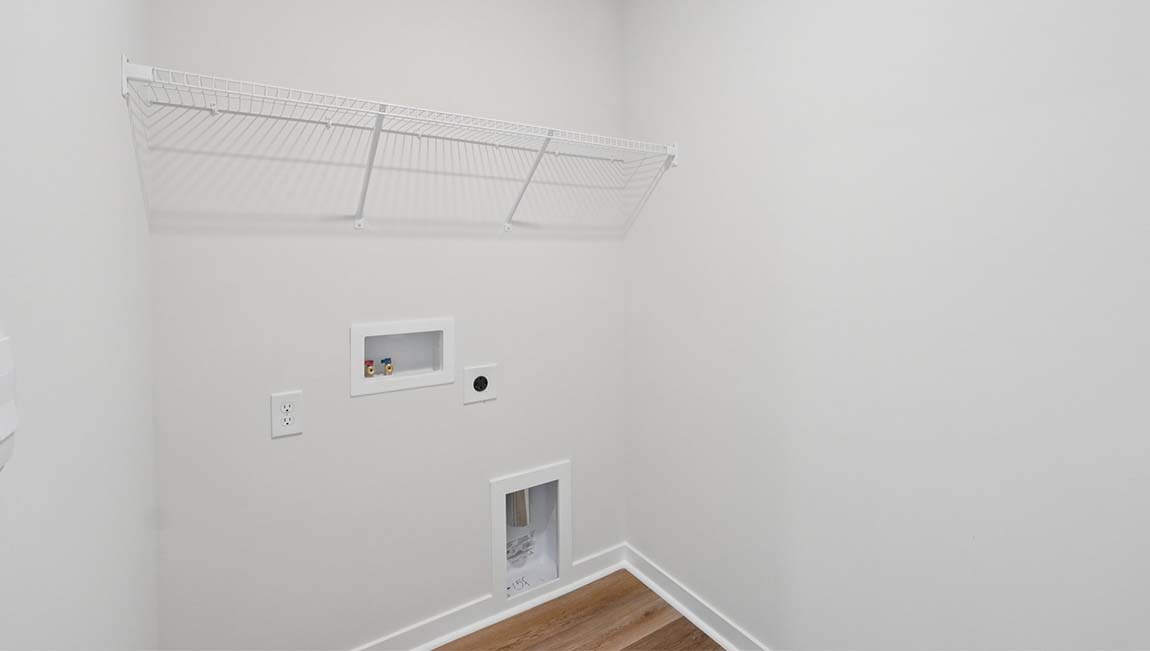 Laundry room with shelving