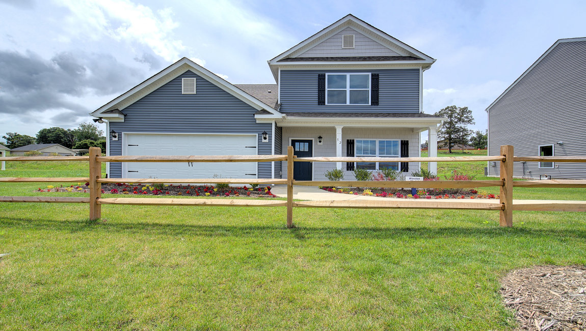 Winston front exterior rendering  with siding, stone, and two car garage