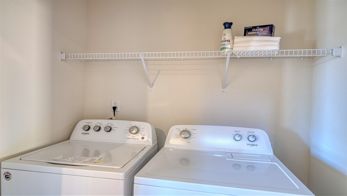 Laundry room with washer and dryer