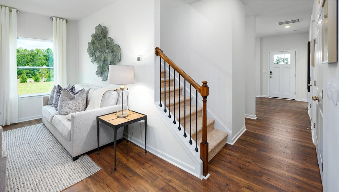 Welcoming foyer with stairs