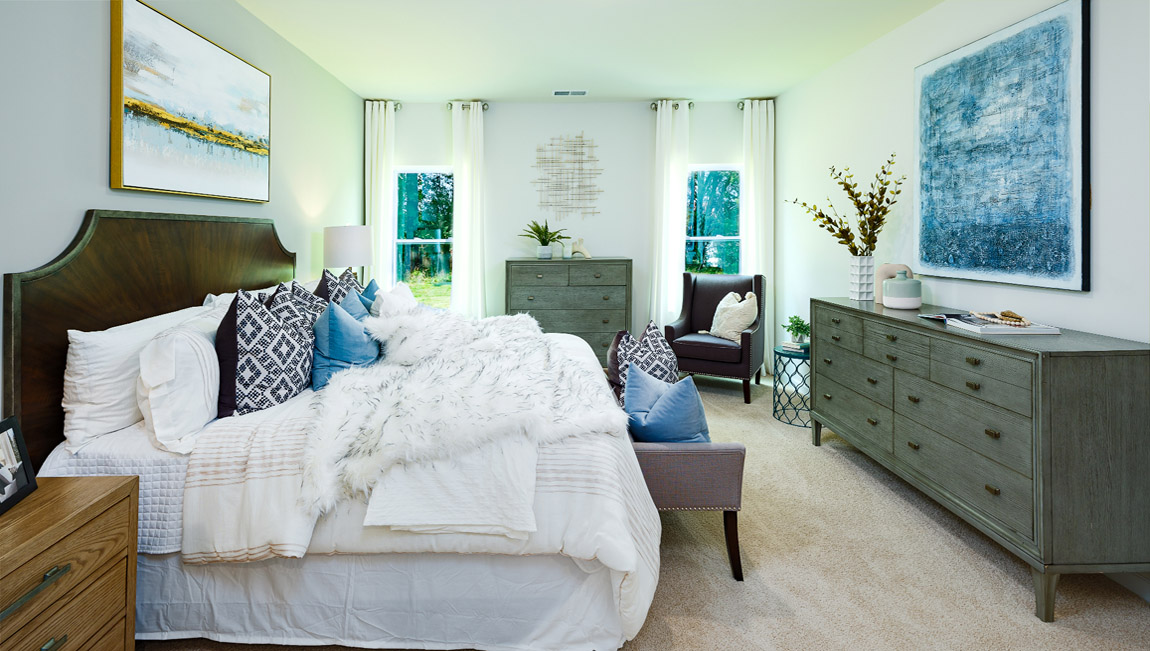Primary bedroom with windows