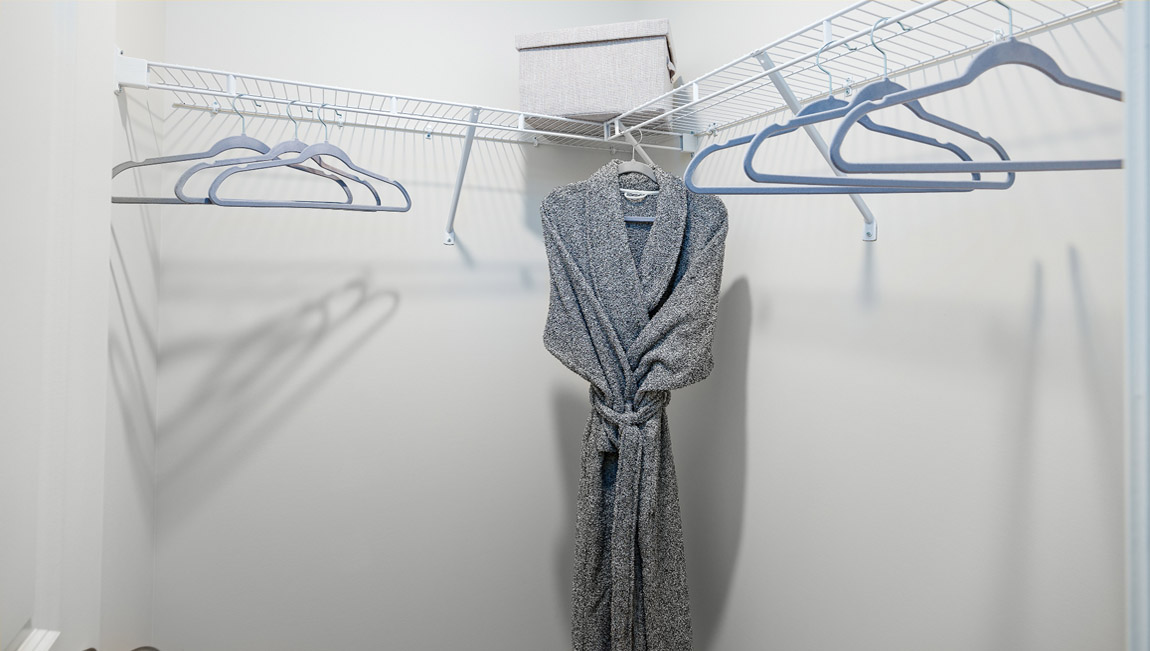 Walk in closet with shelving