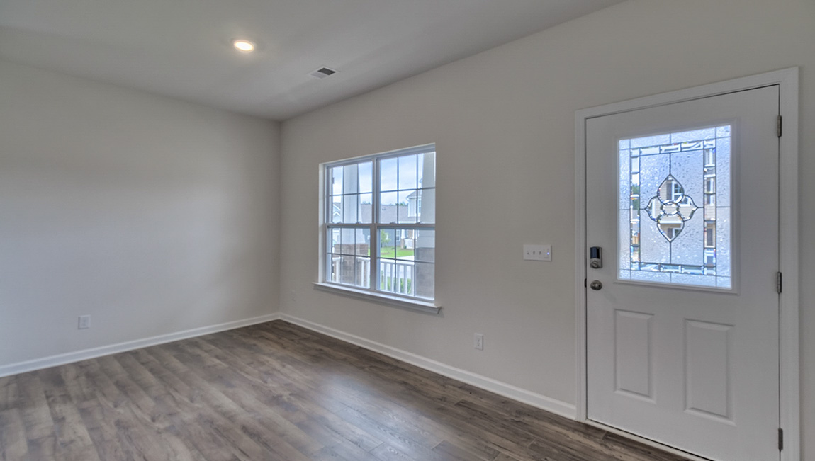 Open living space with front door