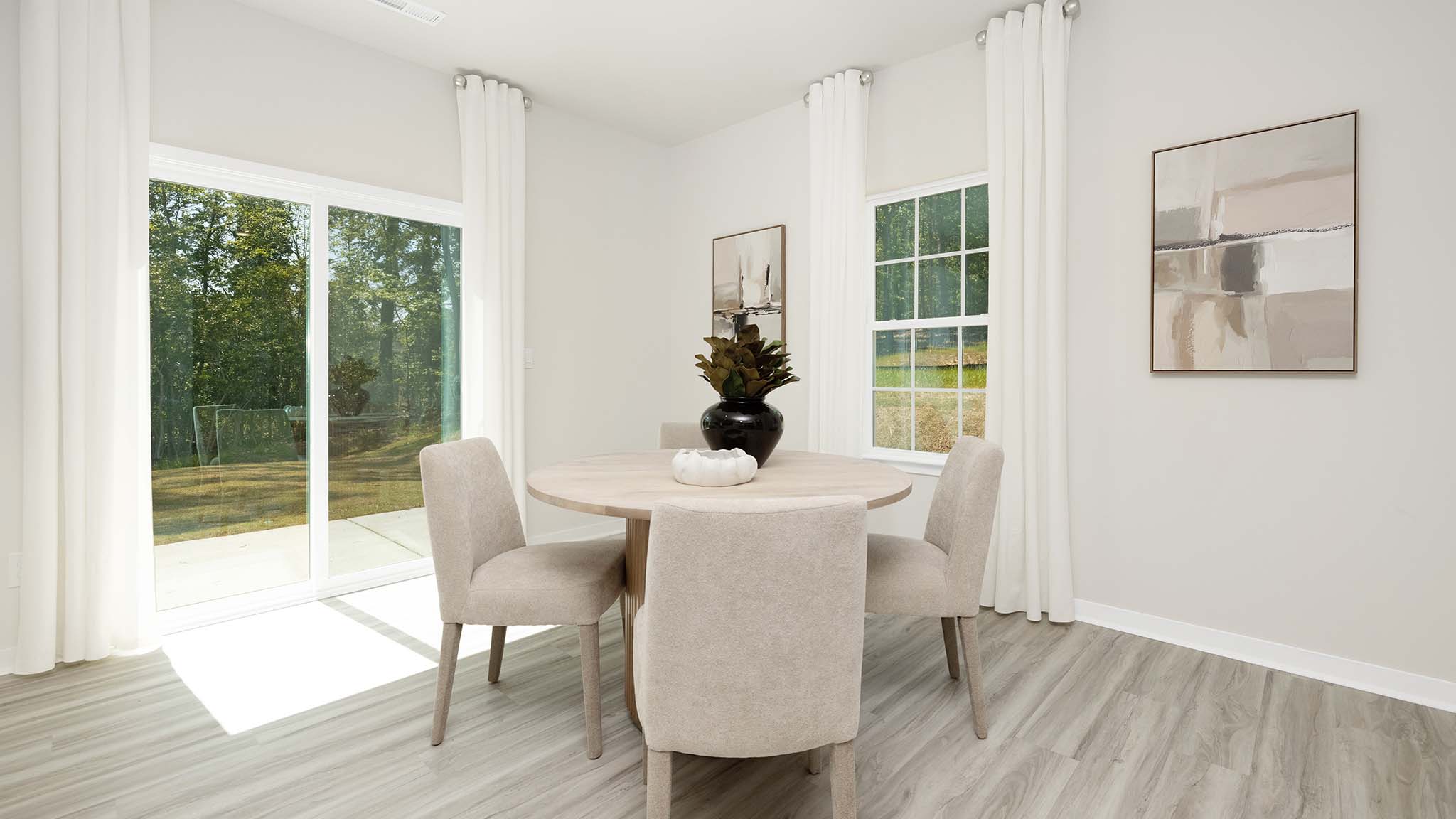 Open dining area with sliding glass door