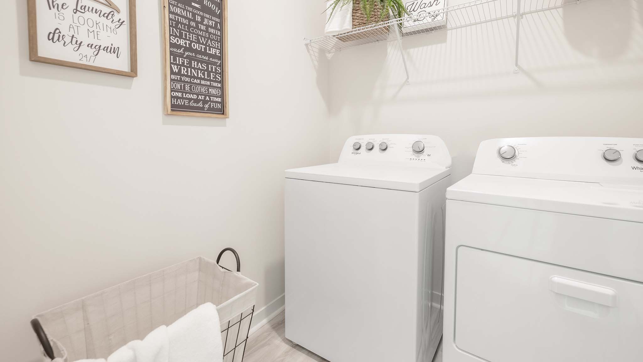 Laundry room with shelving