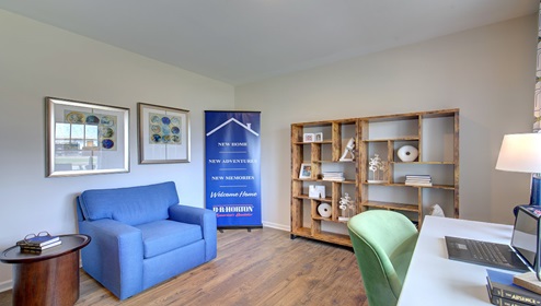 Office space with vinyl floors and large window