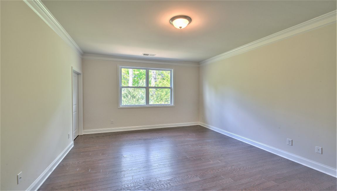 Primary suite with large windows