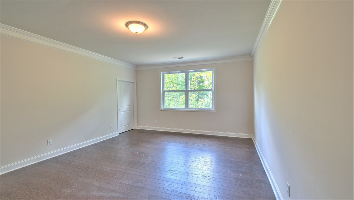 Primary suite with large windows