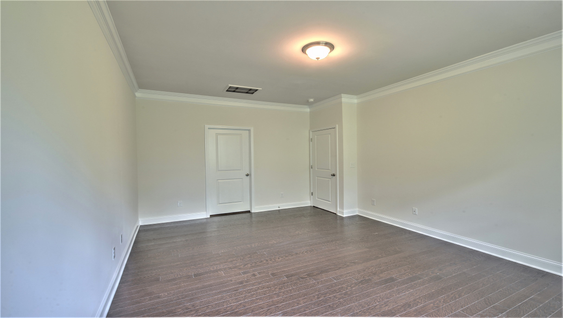 Primary suite with large windows