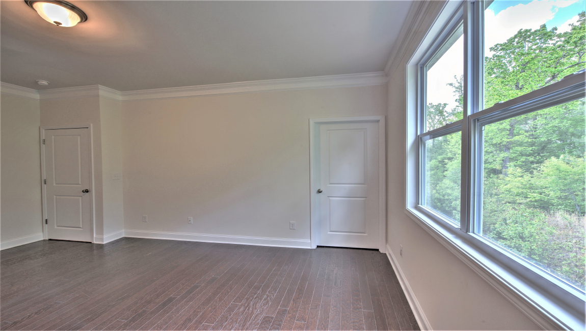 Primary suite with large windowsPrimary suite with large windows