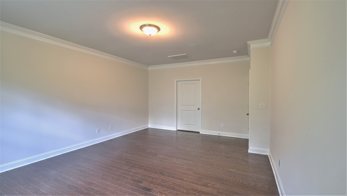 Primary suite with large windows