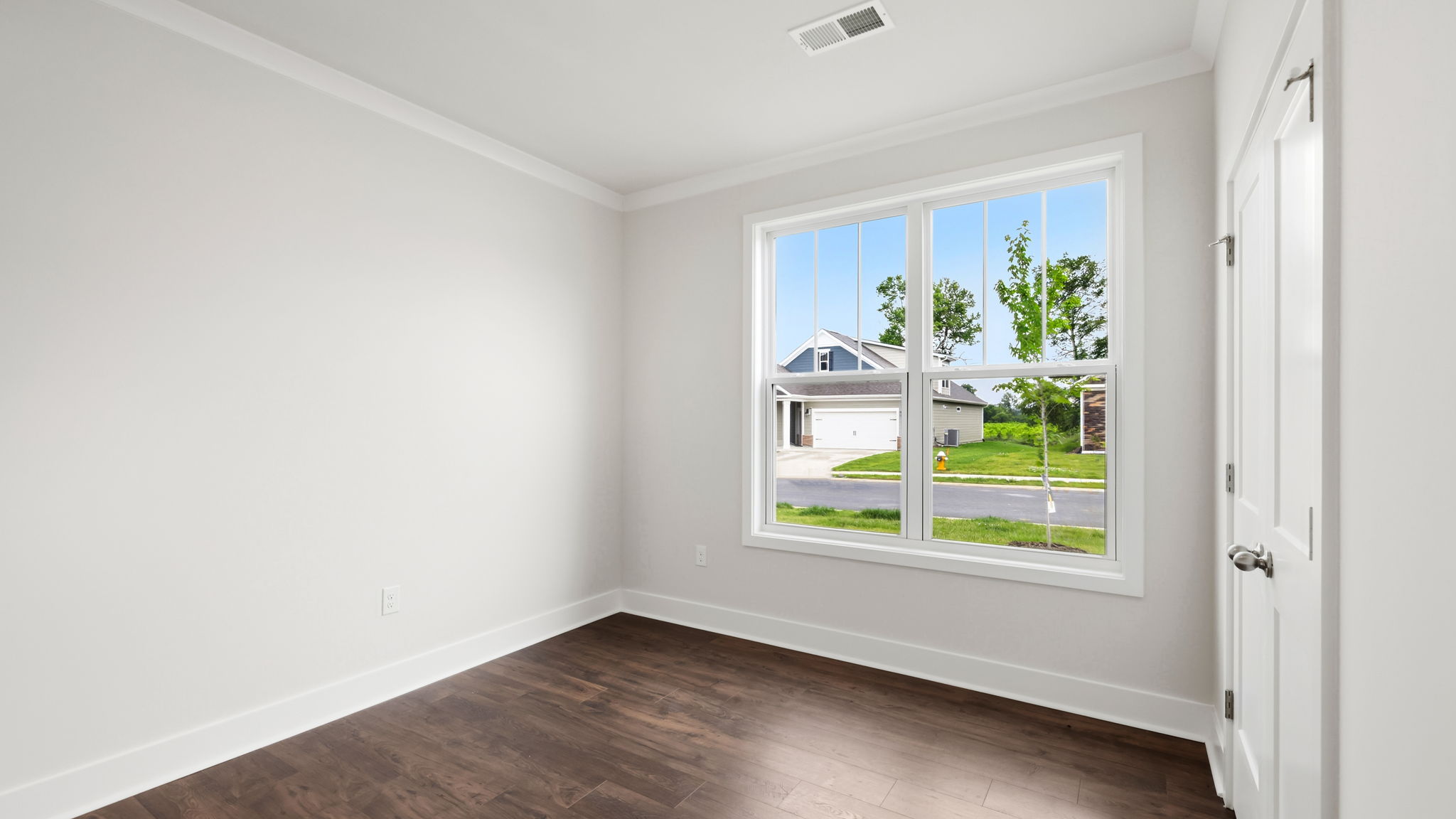 Bedroom with large windows