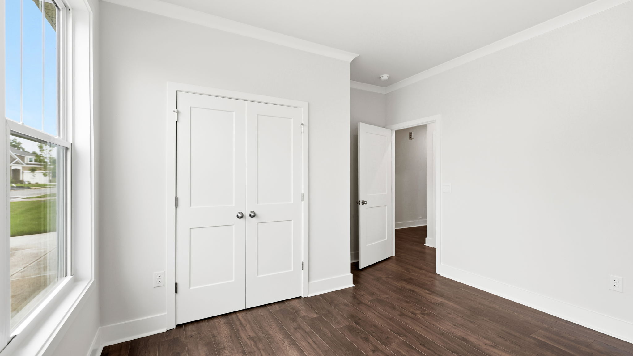 Bedroom with large windows