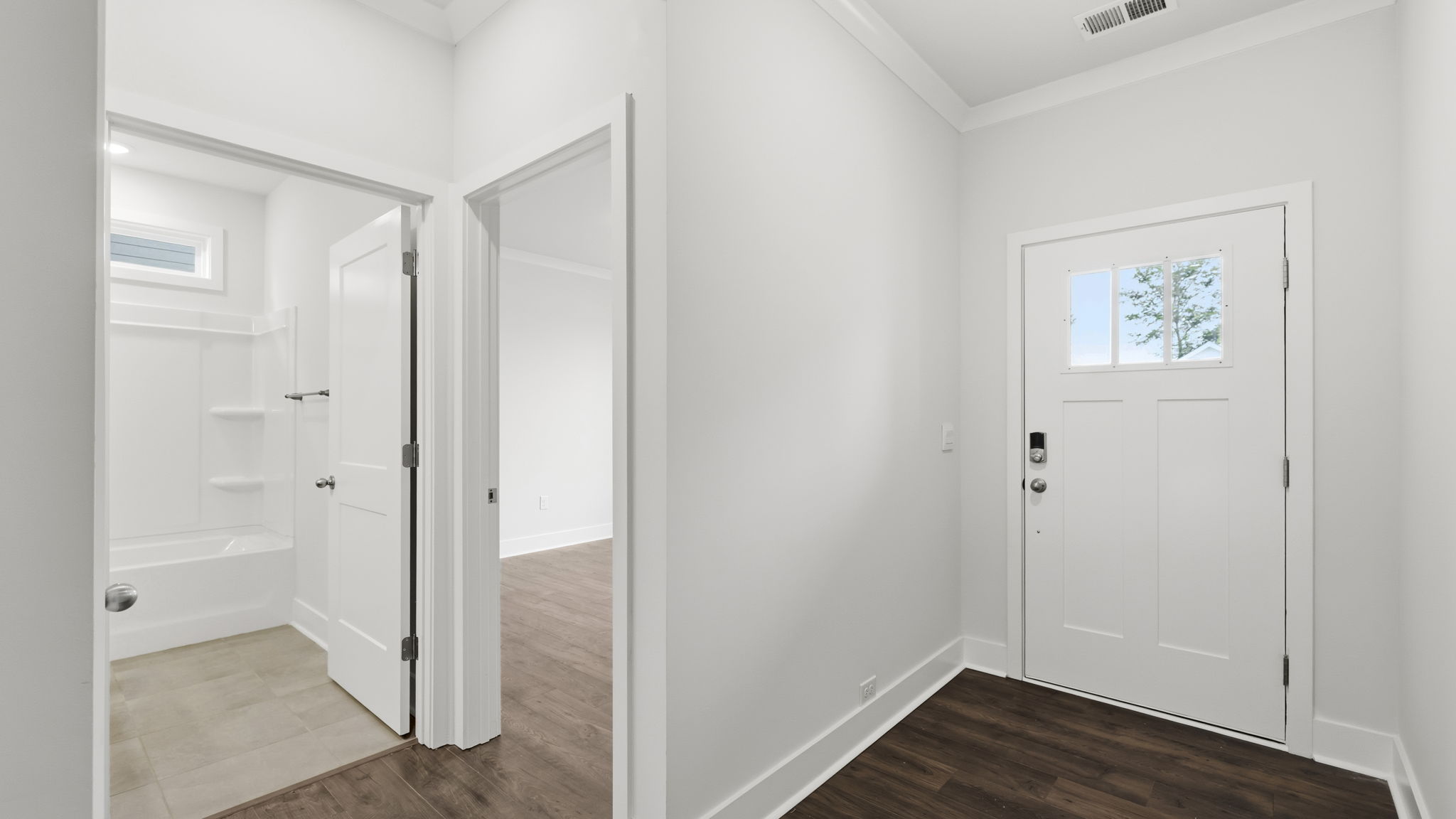 Front foyer with view of bedroom