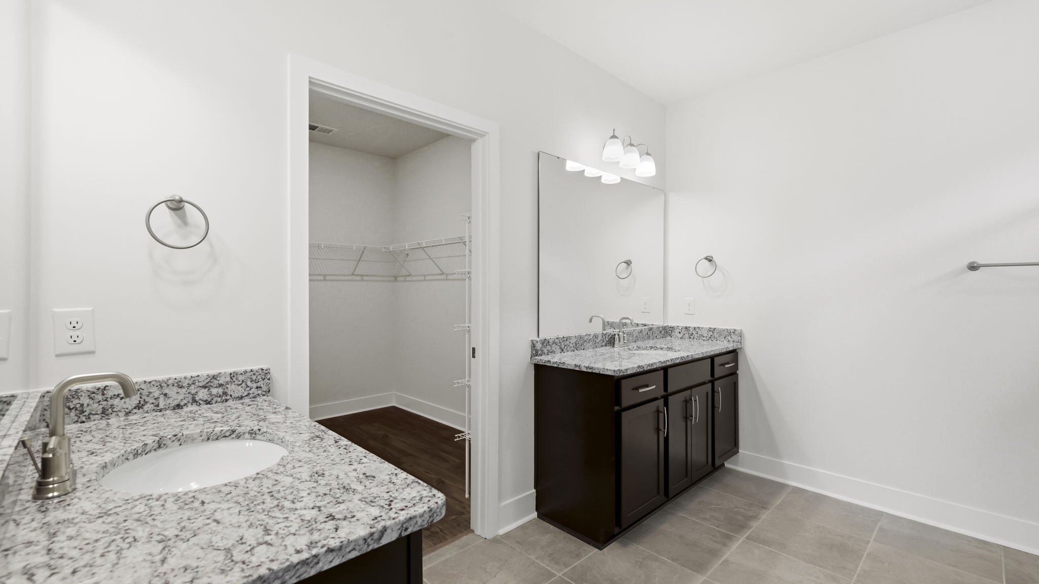 Primary bathroom with two separate vanities