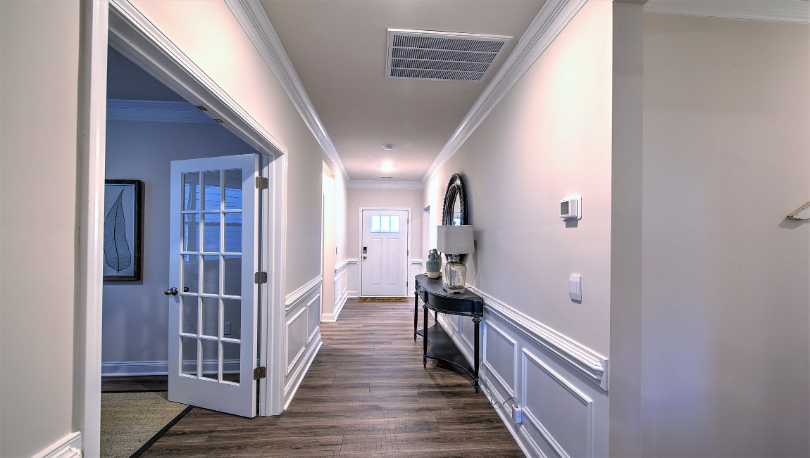 Welcoming foyer, hallway view of front door