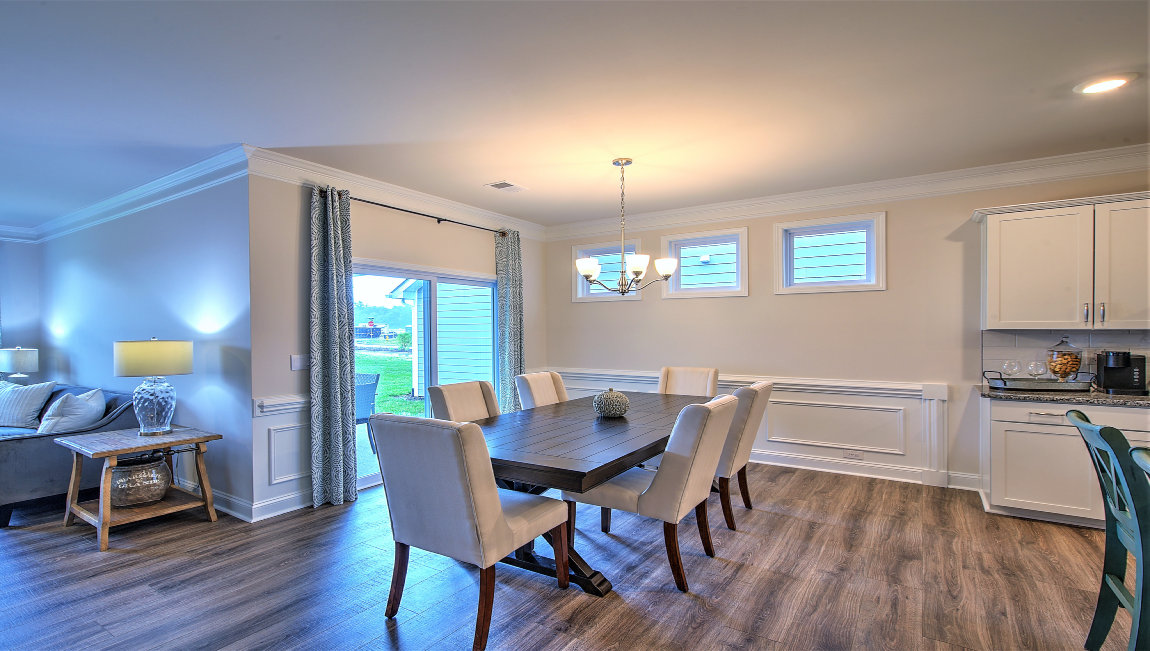 Dining area near kitchen, open near sliding glass doors