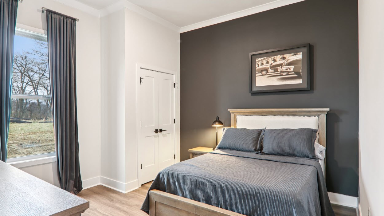 Bedroom with large windows