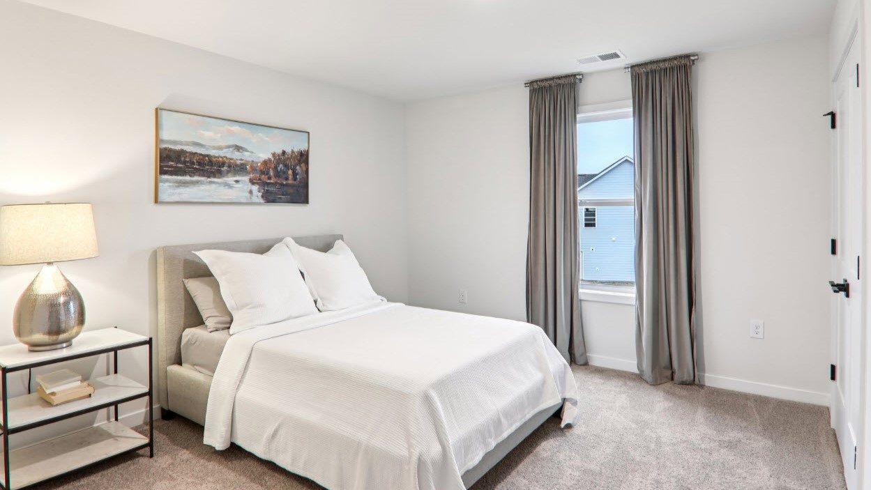 Bedroom with large windows