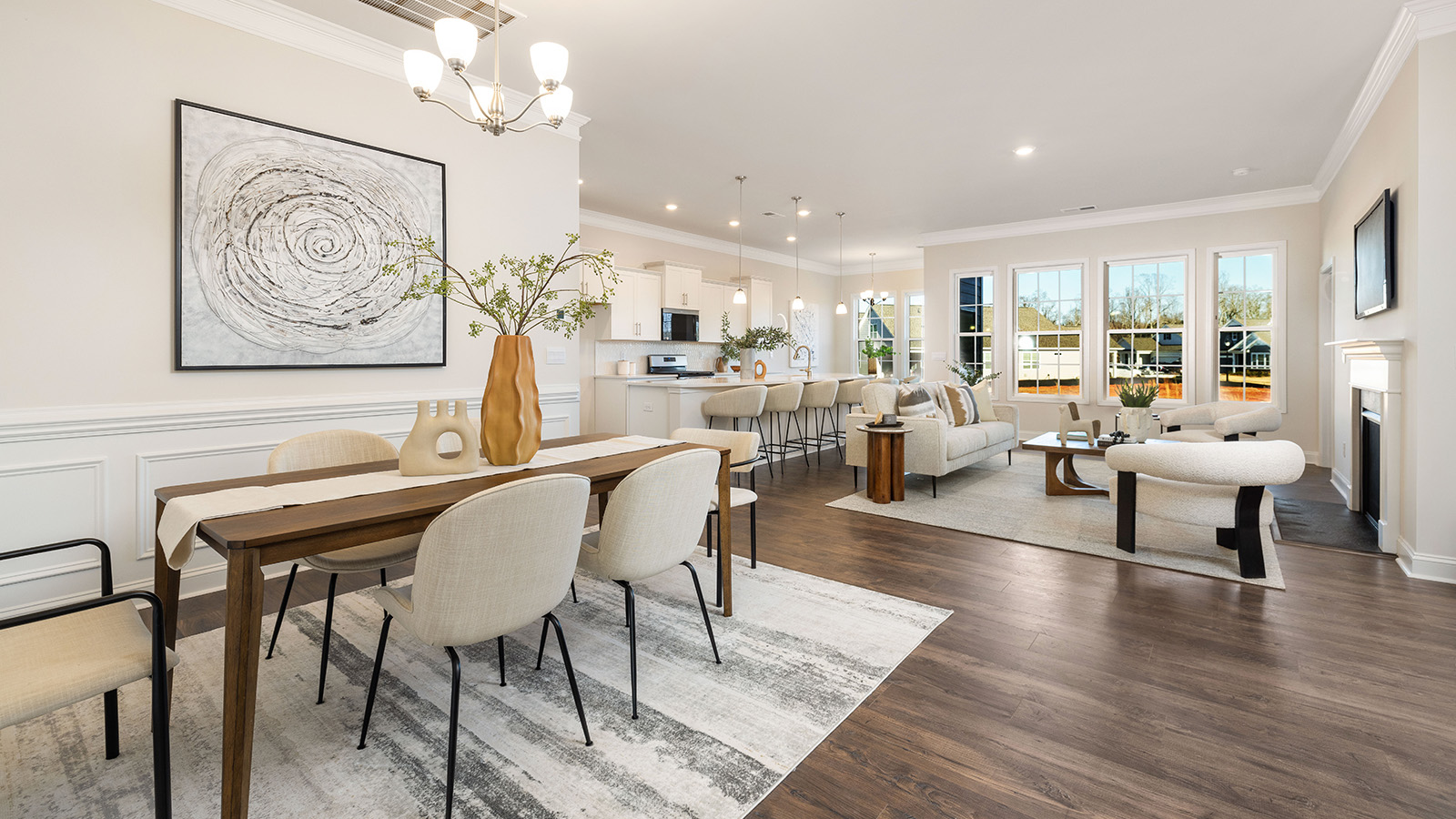 Dining area with wood floors and view of foyer