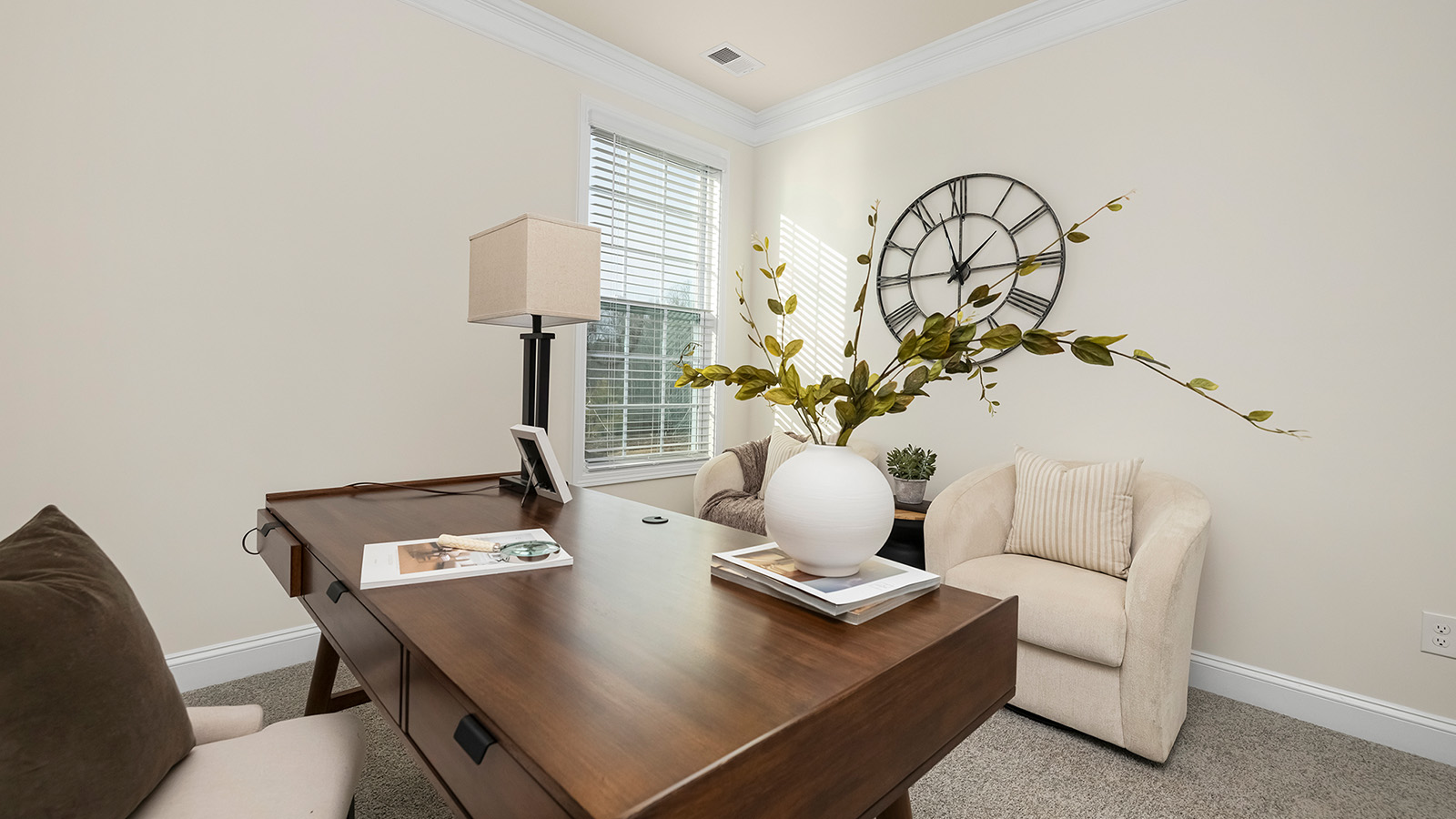 Carpeted bedroom with large window