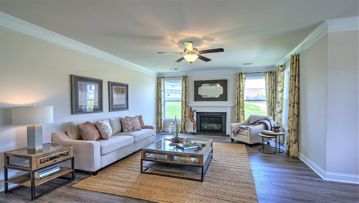 Open living room with fireplace and windows