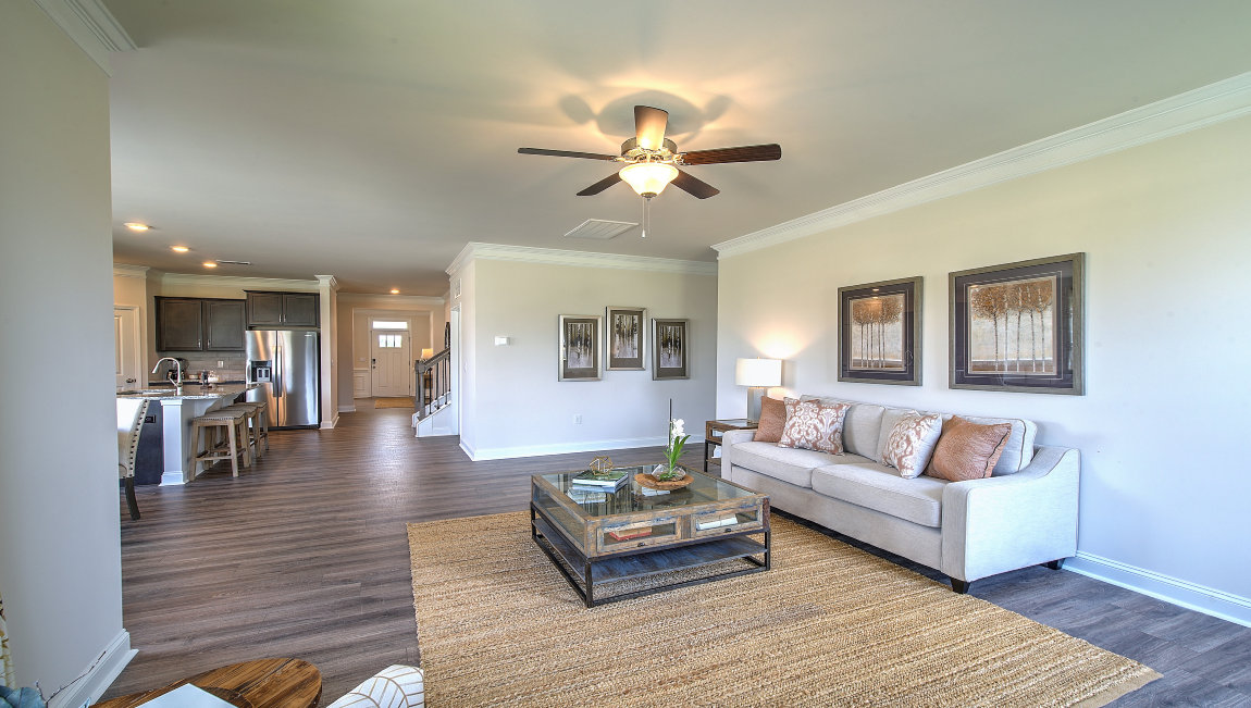 Open living room with fireplace and windows