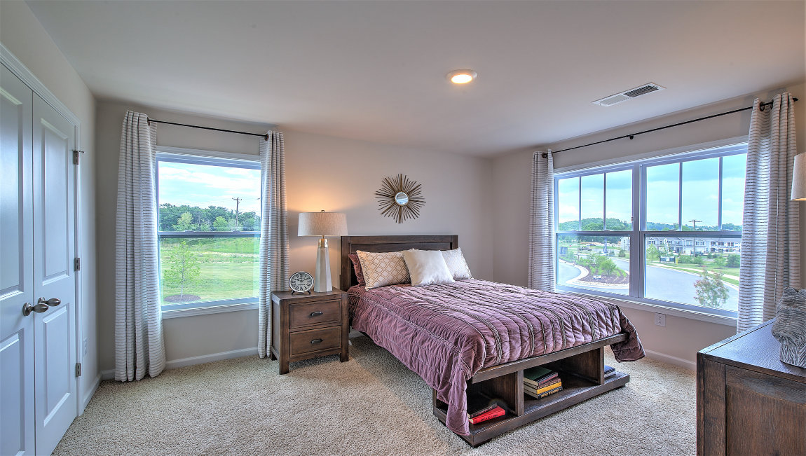 Bedroom with large windows