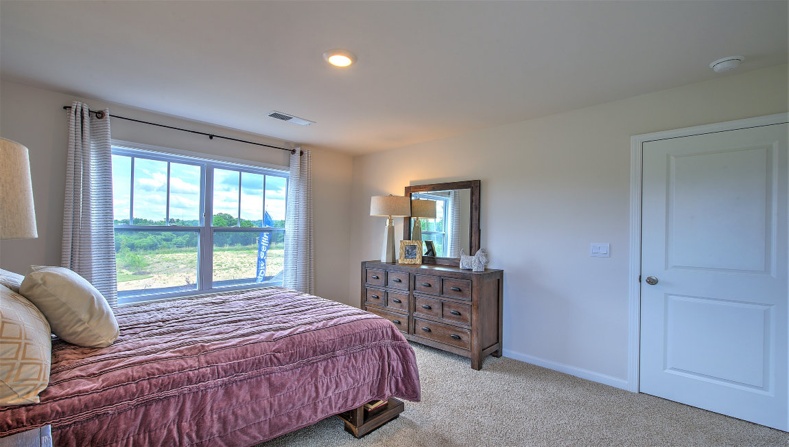 Bedroom with large windows