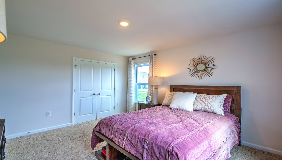 Bedroom with large windows