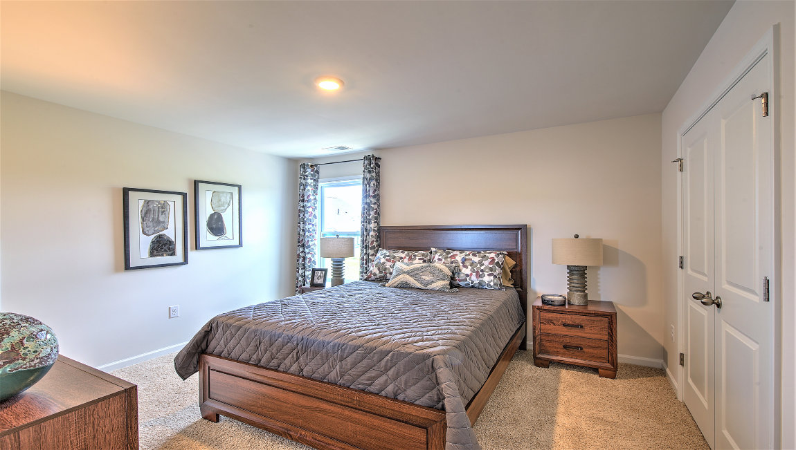 Bedroom with large windows