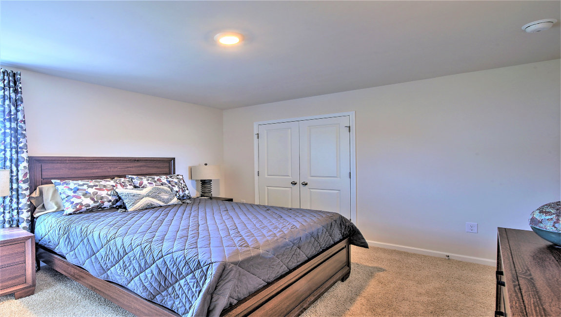 Bedroom with large windows