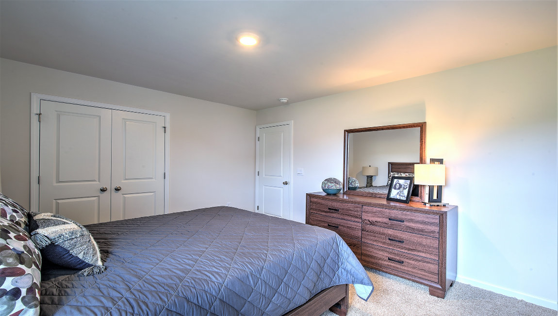 Bedroom with large windows